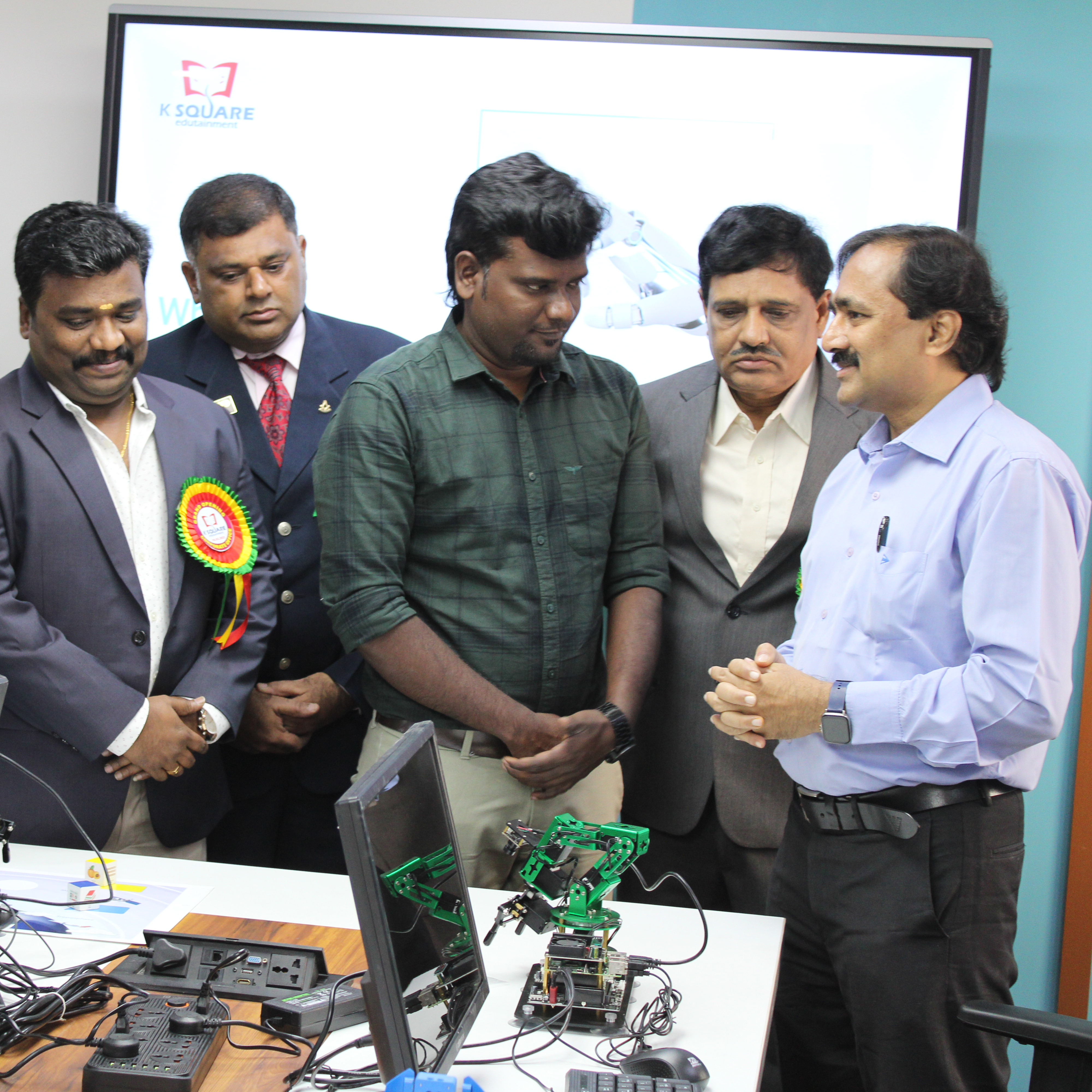 People are listening to the man lecturer.