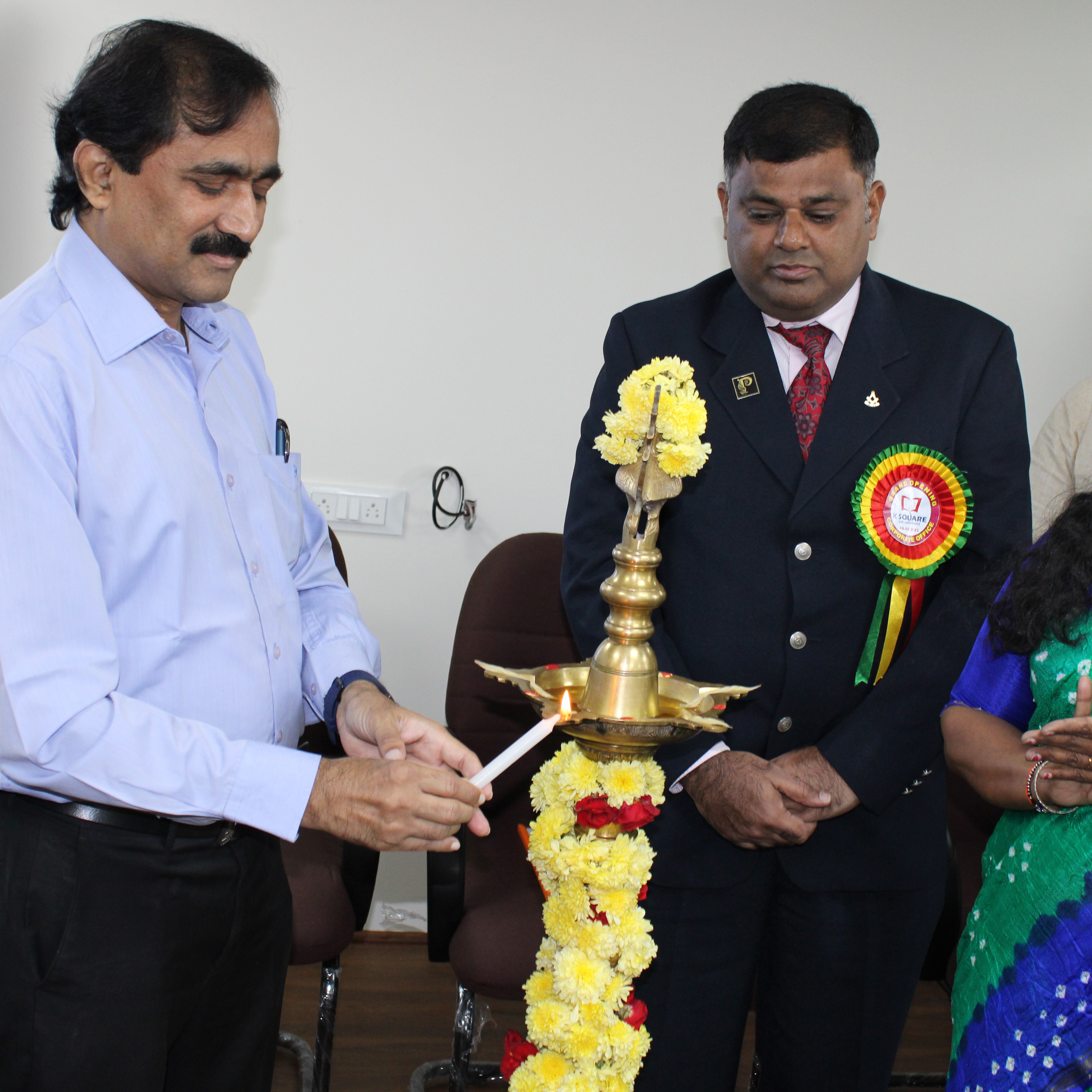 A man wearing a blue shirt, inaugurated with lightning ceremony.