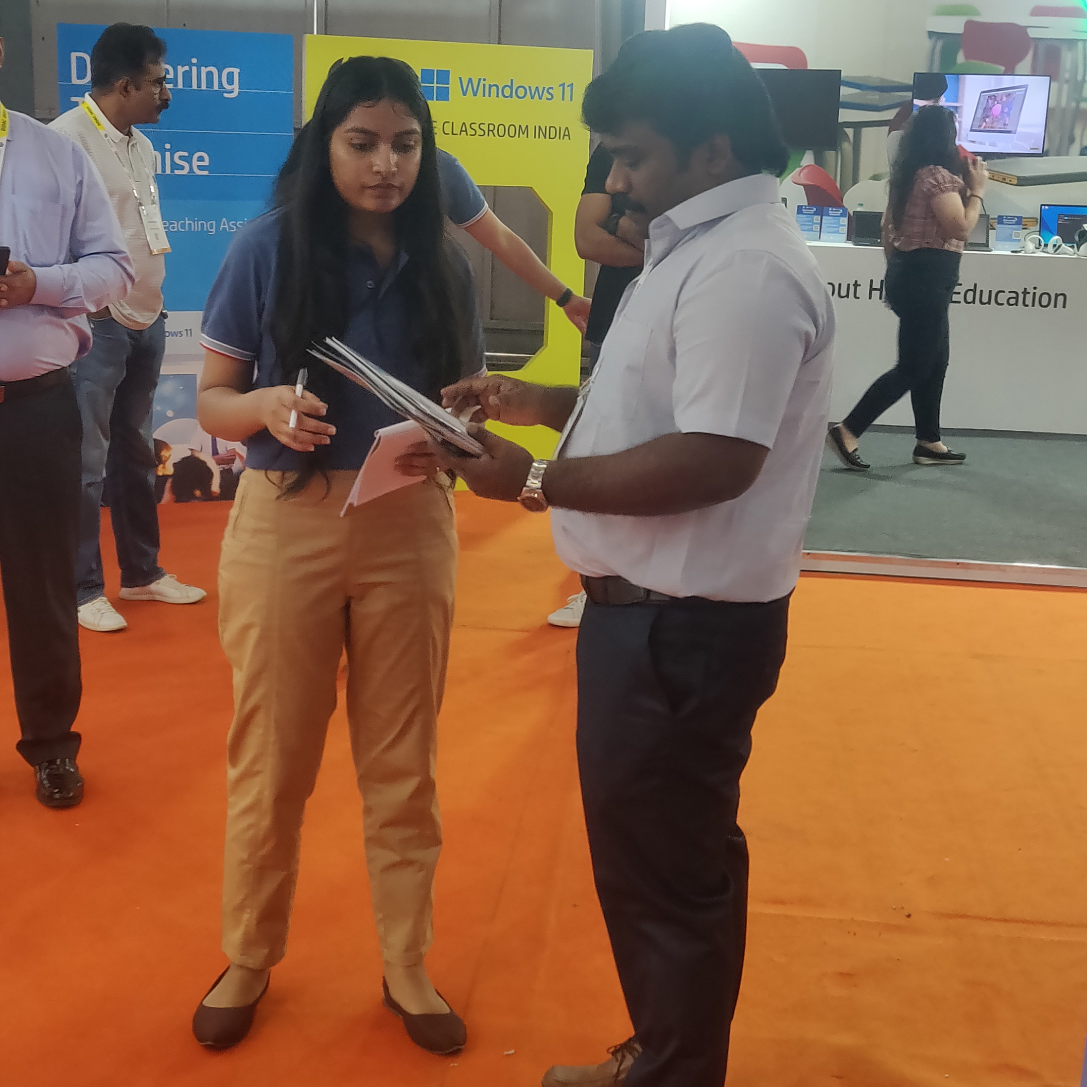 A man and woman engaged in conversation at a K square edutainment social gathering.